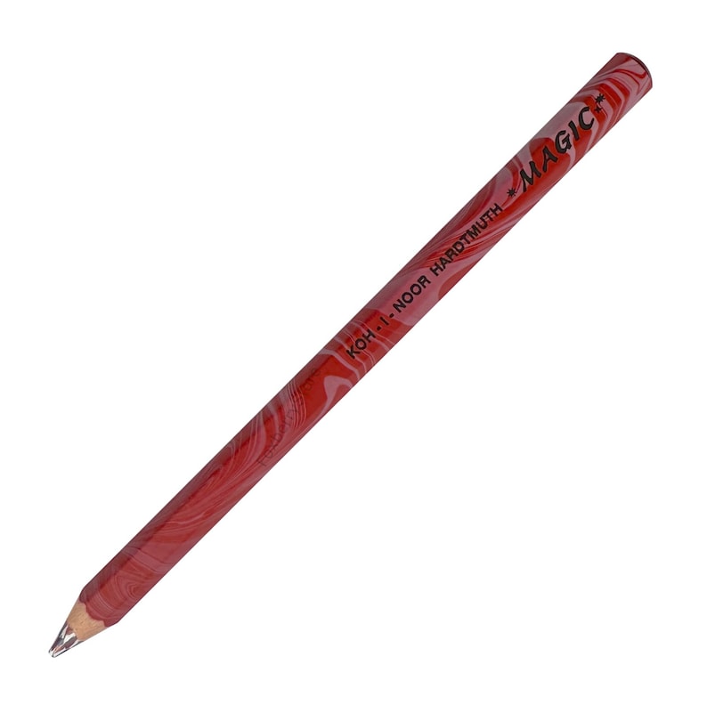 May include: A red and white marbled pencil with the text "KOH-I-NOOR HARDTMUTH MAGIC*" printed on it.