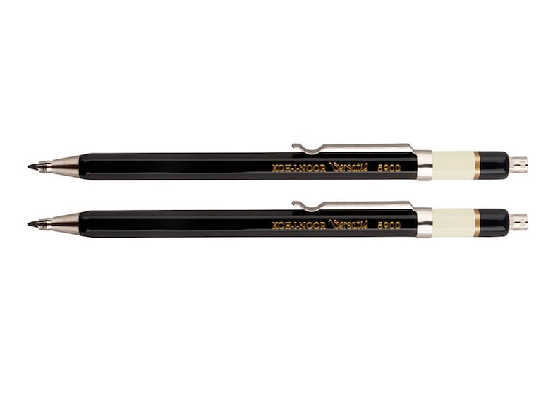 May include: Two black mechanical pencils with silver accents and a white eraser. The pencils have the text "KOH-I-NOOR Versatil 5900" printed in gold on the side.