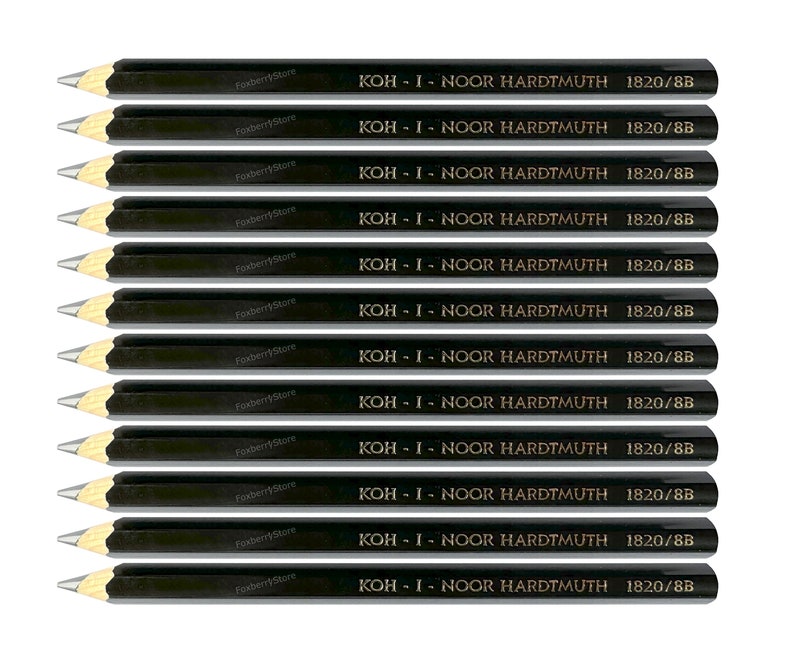 May include: Twelve black pencils with silver tips. Each pencil has gold lettering that reads "KOH-I-NOOR HARDTMUTH 1820/8B".