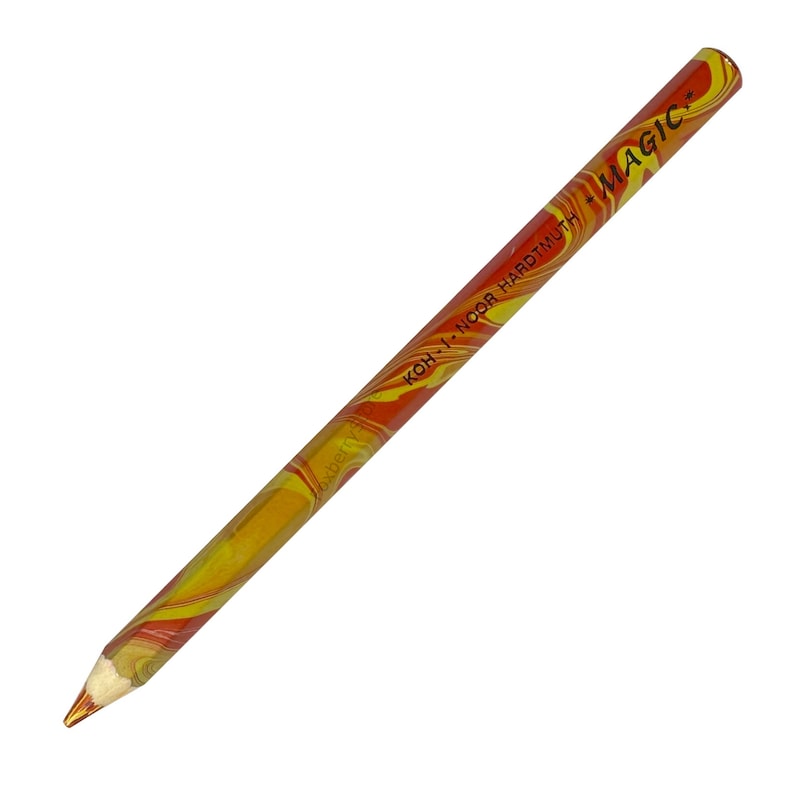 May include: A red and yellow marbled pencil with the text "KOH-I-NOOR HARDTMUTH MAGIC" printed on the side.