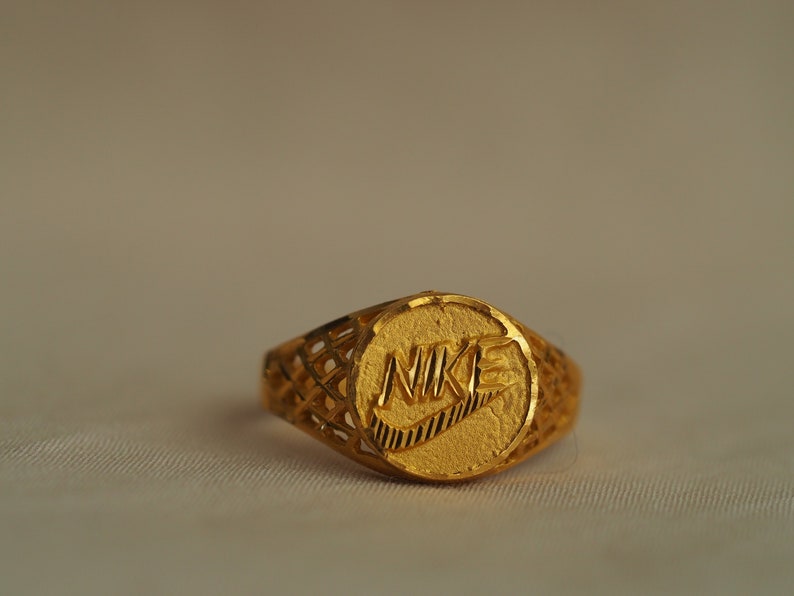 nike gold ring