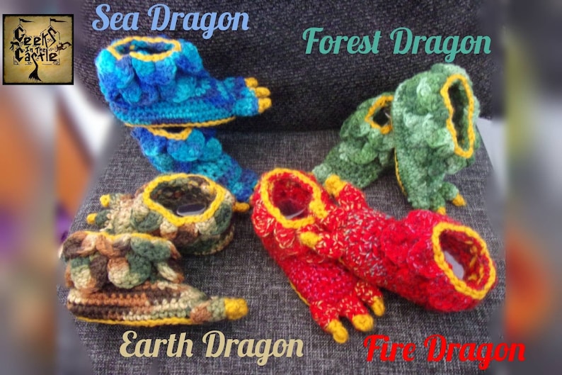 May include: Four pairs of crocheted dragon slippers in different colors: blue, green, brown, and red. Each pair has yellow accents and a unique design.