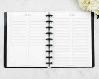 May include: A white planner with black rings and the text "TO DO" at the top of each page. The planner has a blank space for notes and a checklist.