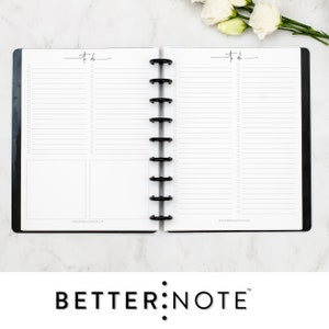 May include: An open black and white planner with a to-do list on each page. The planner has a black binding with silver rings. The planner is open to a page with a to-do list on the left side and a blank page on the right side. The planner is on a white marble surface.