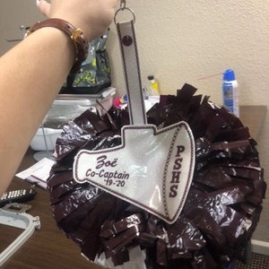 Pom Holder