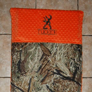 Custom appliqued camo nap mat cover with straps