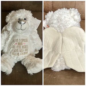 May include: White plush teddy bear with angel wings. The bear has embroidered text that reads "Here's a special hug sent from heaven. Always with you, Uncle Chase."