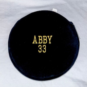 Personalized stuffed hockey puck
