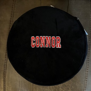 Personalized stuffed hockey puck