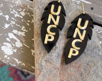 Black and gold feather UNCP