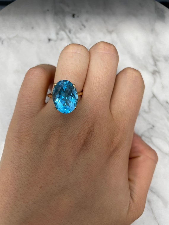 14K Yellow Gold Oval cut Blue Topaz Solitaire Ring - image 2