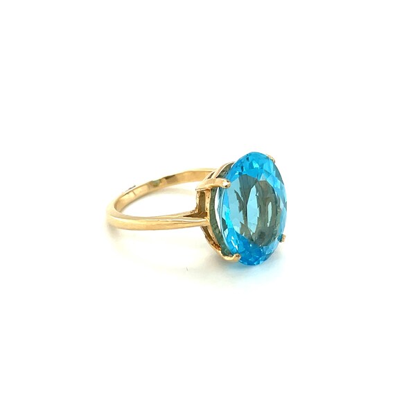 14K Yellow Gold Oval cut Blue Topaz Solitaire Ring - image 6