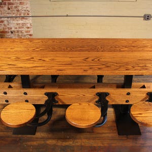 Oak Cafe Style Dining Table with Attached Swing Out Seats image 6