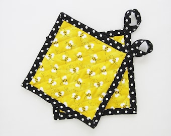 Set of two yellow, black and white bumblebees bordered with black and white polka dots, quilted potholders, housewarming gift, Mother's Day