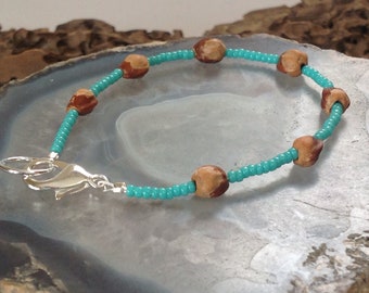 Pulsera protectora de cuentas fantasma de bayas de enebro turquesa