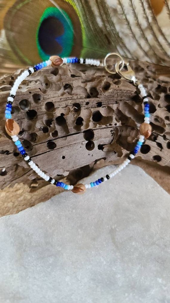 Ghost Beads are believed to provide protection from evil spirits and are  often given to Navajo children to keep away bad dreams. These ghost bead...  | By Old Friends Trading Company GJFacebook