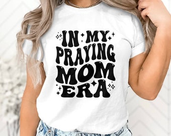 In my Praying mom era tee