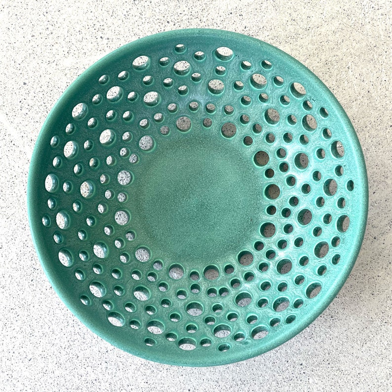 NEW...Fruit Bowl...a must for airing your avocados, pitted fruit or tomatoe's before they're ripe...in 4 glaze colors...and 3 sizes. Green