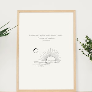 May include: A framed print with a black and white illustration of a sunrise over a mountain range. The text reads "I am the rock against which the surf crashes. Nothing can break me. Sarah J. Maas."