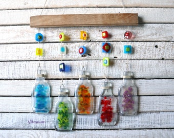 Sun catcher for garden or home recycled bottles and stained glass wall panel.