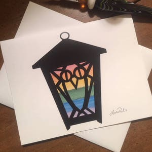 Tarjeta de notas linterna arco iris