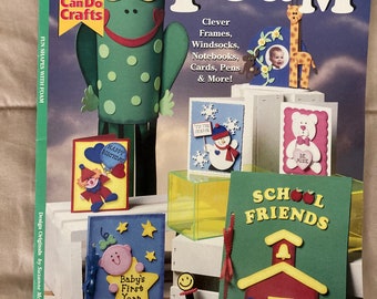 May include: A book cover with the title "Fun Shapes with Foam" and a green frog illustration. The book features craft projects for making frames, windsocks, notebooks, cards, and more.