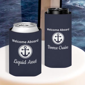 May include: Two navy blue can coolers with white text and anchor designs. One cooler says "Welcome Aboard" and "Liquid Asset." The other says "Welcome Aboard" and "Booze Cruise."