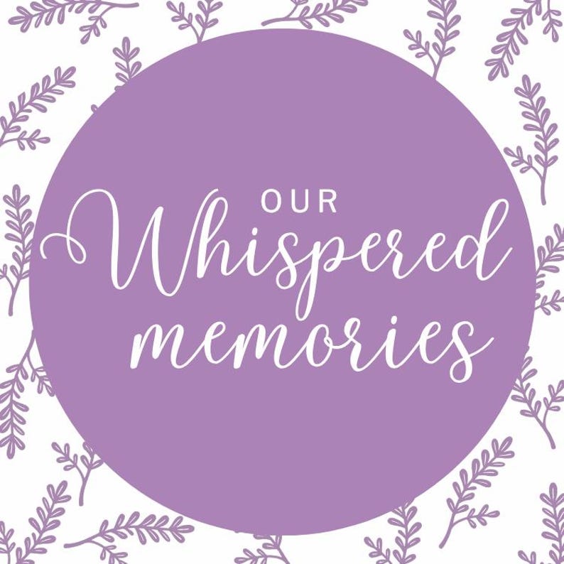 May include: A circular design with the words "Our Whispered Memories" in white script on a lavender background. The background features a repeating pattern of lavender sprigs on a white surface.