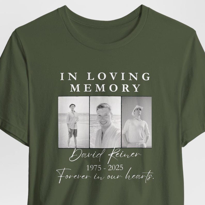 May include: Olive green t-shirt with the text "IN LOVING MEMORY" above three black and white photos. Below the photos is the name "David Reiner" and the years "1975-2025". The phrase "Forever in our hearts" is below.