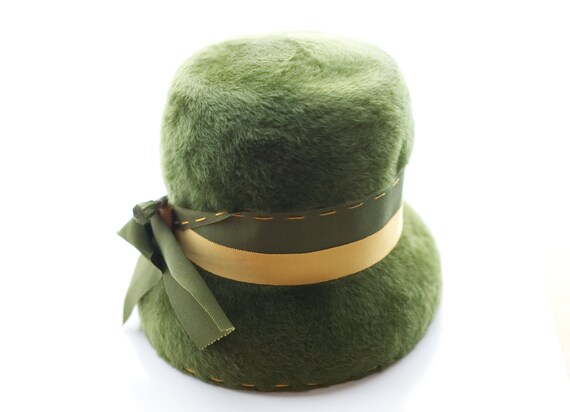 green fuzzy hat