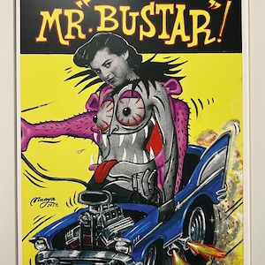 May include: Framed art print featuring a retro-style illustration. The artwork depicts a woman's face combined with a monster driving a blue hot rod. The text "MR. BUSTAR!" is at the top, with the artist's signature and edition number at the bottom.