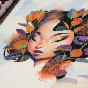 May include: Watercolour painting of a woman's face with colourful leaves and flowers around her head. The woman has dark hair, brown eyes, and pink lips. The leaves are shades of green, orange, and purple.