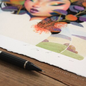May include: A watercolour painting of a woman with colourful flowers and leaves in her hair. The background is a soft blue and green landscape with hills and a few small trees. The painting is signed "BaoPhamArt.etsy.com" in the bottom right corner.