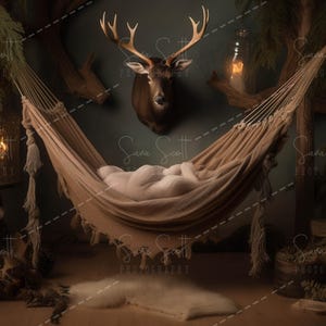 May include: A brown hammock with a white blanket inside, hanging between two wooden branches. A mounted deer head with antlers is on the wall behind the hammock. There are also some decorative elements, such as a lantern and a wooden log.