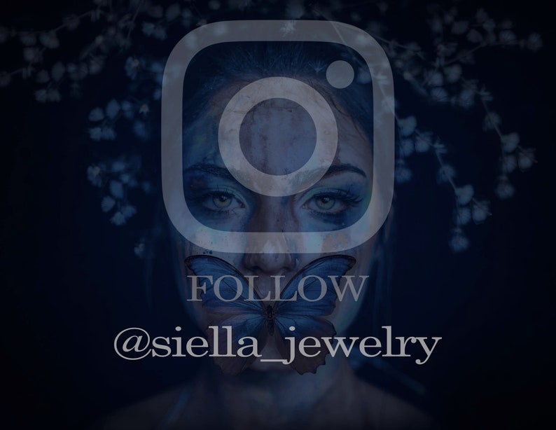 May include: A dark blue image featuring a woman's face with a butterfly over her mouth. The Instagram logo is overlaid, with the word "FOLLOW" and the username "@siella_jewelry" in white text. The background has white floral accents.