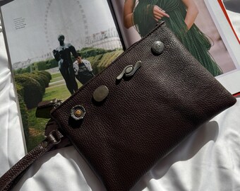 Bolso de piel marrón, neceser, bolso de mano, neceser con tachuelas.