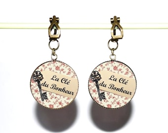 Clips d’oreilles bronze avec cabochons en résine * La clé du bonheur *