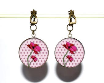 Pendientes de bronce con cabujones de resina *Flores fucsias*