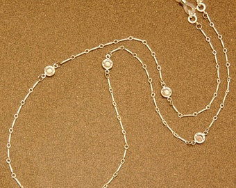 Versailles spectacle chain - Swarovski round crystal on silver-plated chain.