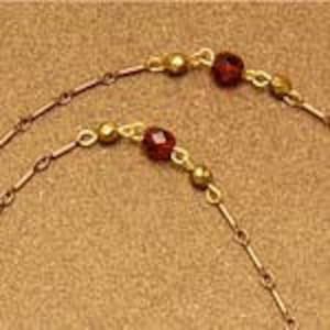Carmel - Glasses chain - Ruby coloured glass beads on copper-coloured chain - Easily converts to necklace!