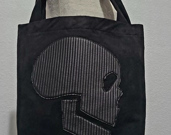 Die Wanderer Artista Serie Piraten-Totenkopf-Einkaufstasche aus schwarzem Wildleder