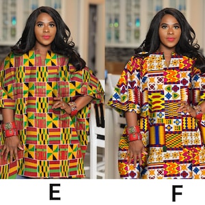 以下が含まれることがあります： Vネックのカラフルな模様の入った長袖シャツを着た女性2人。シャツは黄色、赤、緑、青、白の幾何学模様。シャツはゆったりとしたシルエットでリラックスしたスタイルです。