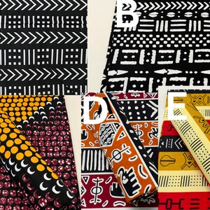 May include: Five different fabric swatches with various black and white geometric patterns, and colorful patterns with yellow, orange, red, and black. The swatches are labeled A, B, C, D, and E.