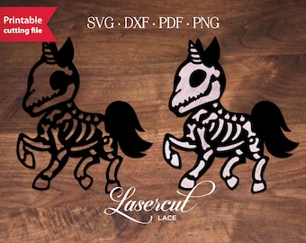 May include: Two black and white skeleton unicorn illustrations. The unicorns are facing right and have a horn, a tail, and a skeletal body. The text "Lasercut Lace" is at the bottom of the image.
