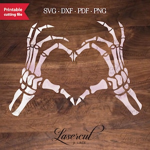 May include: Two white skeleton hands forming a heart shape. The image is on a brown wooden background with the text "Lasercut Lace" at the bottom.
