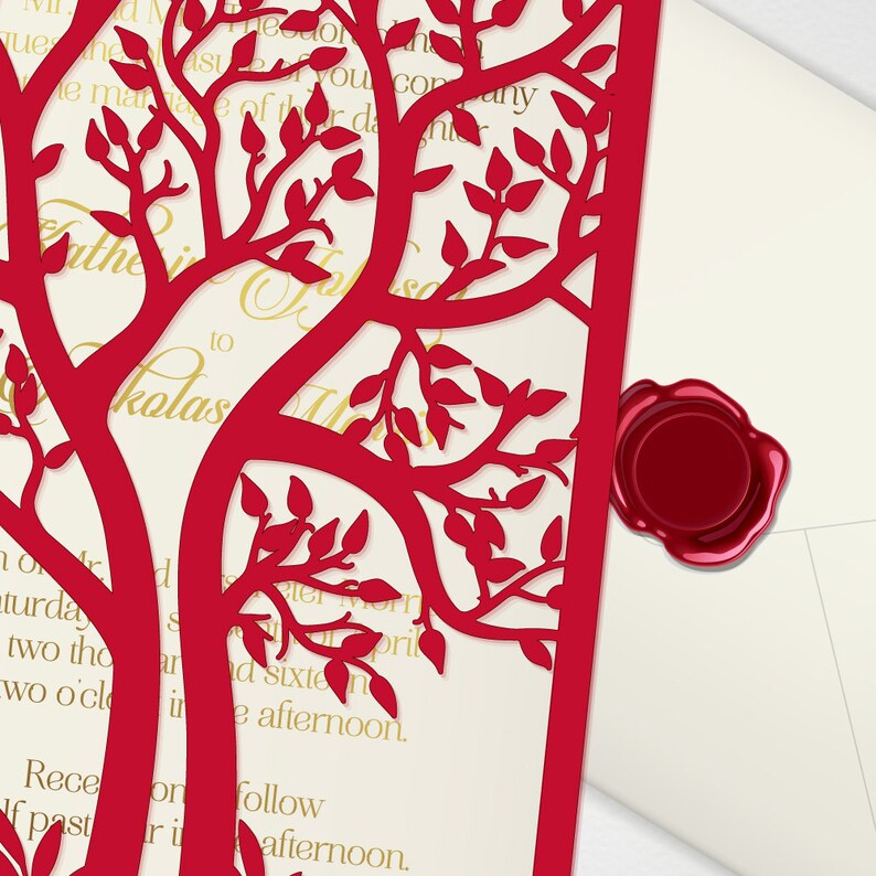May include: Red laser-cut paper invitation with a tree design. The invitation text reads "The marriage of [name] to [name] Saturday, the sixteenth of April, two thousand [year] at two o'clock in the afternoon. Reception to follow at [time] in the afternoon."