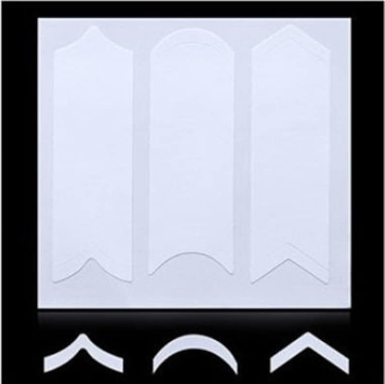 May include: Three white nail guide stickers with different shapes: a straight edge, a curved edge, and a pointed edge. The stickers are designed to help create perfect nail lines.