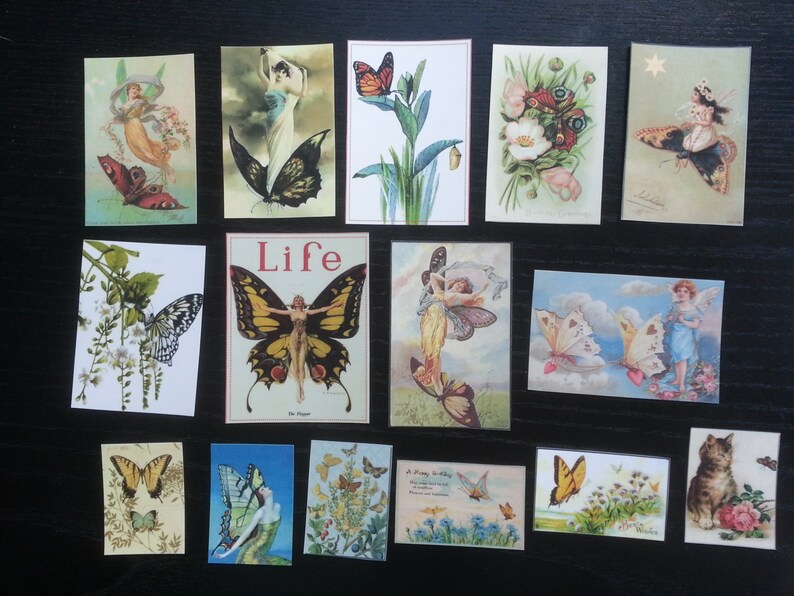 May include: A collection of vintage postcards featuring butterflies, fairies, and floral designs. The postcards are printed on thick paper with a glossy finish. Some of the postcards have a white border, while others have a colored border. The postcards are in good condition and would make a great addition to any collection.