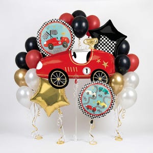 May include: A festive balloon bouquet featuring a large red race car balloon with the number 1, surrounded by black, red, gold, and white balloons. Includes star and round balloons with race car graphics.
