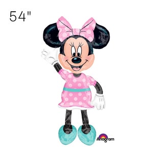 May include: A 54 inch pink and white polka dot Minnie Mouse foil balloon. She is wearing a pink dress with a turquoise sash and has a pink bow in her hair.